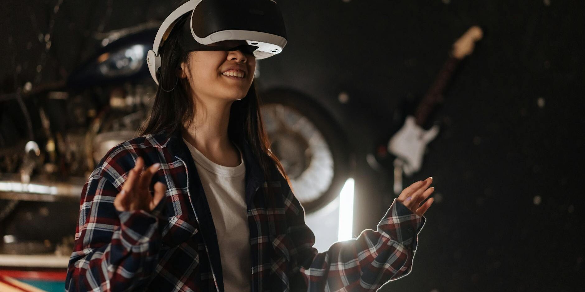 happy woman using virtual reality goggles